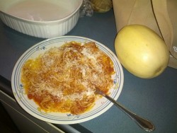 Do you see this delicious plate of spaghetti?   Would you believe that it came out of the yellow vegetable there on the right?  Well you better. Because this glorious veggie is the spaghetti squash and its fucking magic.