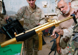 drugwar:  U.S. Army soldiers and a translator inspect a gold