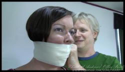 elizabethandrews:  Kitty LaRouge gets a tight microfoam gag from