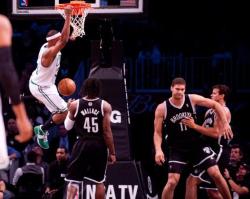 Chris Humphries feeling up Brook Lopez; meanwhile The Truth slams
