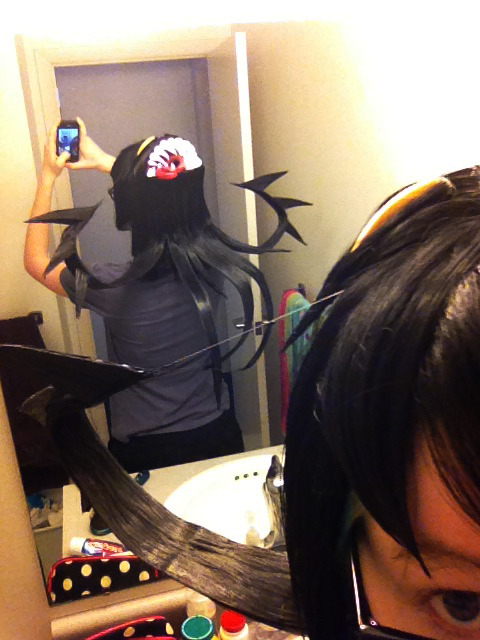 schmemy:  Wig update! He’s finished!!! Please enjoy the phone pictures (i don’t have an actual camera) in my bathroom, as well as one picture of him on the wig stand surrounded by chunks of hair and other necessities. I also didn’t gel my hair or
