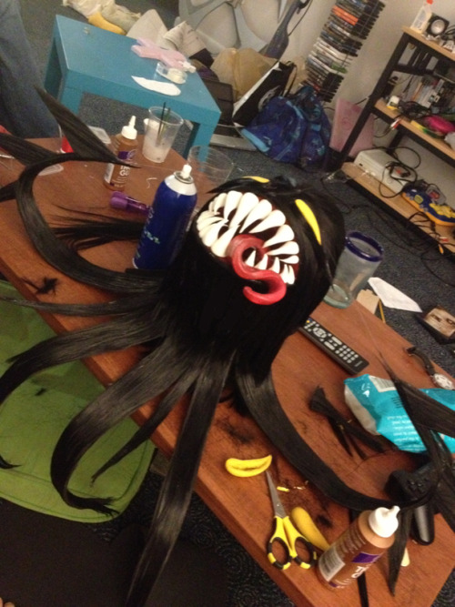 schmemy:  Wig update! He’s finished!!! Please enjoy the phone pictures (i don’t have an actual camera) in my bathroom, as well as one picture of him on the wig stand surrounded by chunks of hair and other necessities. I also didn’t gel my hair or