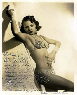 Sahji     (aka. Madeleine Jackson) Beautiful vintage 30’s-era promo photo of Ms. Jackson, who was a Feature dancer at NYC&rsquo;s famed &lsquo;Cotton Club&rsquo; nightspot from 1933 to 1939.. She personalized the photo to a fellow dancer: “To