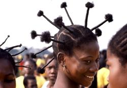 dynamicafrica:  Portrait of a girl with her hair threaded in