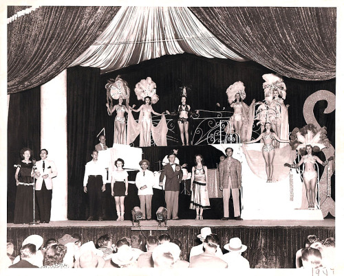 Royal American Shows - 1947 Vintage formal portrait photo featuring the full cast of the 1947 ‘Royal American Shows’ travelling tent show.. 'Royal American’ was one of the longest-running Carnival circuit burlesque shows; and competed