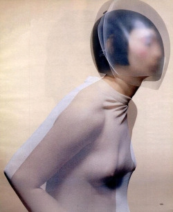 sloppy:  Cocoon dress by Hussein Chalayan, glass headpiece by