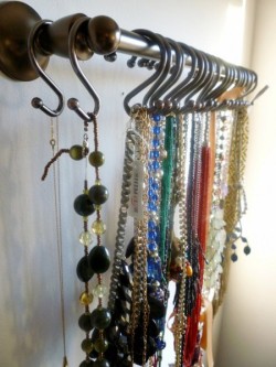 Great idea for necklace storage using shower curtain hooks and