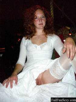 redheadspics:  Sexy ginger redhead dressed all in white, spreading