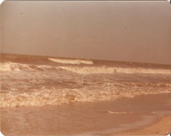 boxesofoldphotos:  The waves crashing at a beach, perhaps Virginia