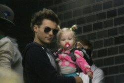chasing-satellites:  Louis holding baby Lux in NYC today.  