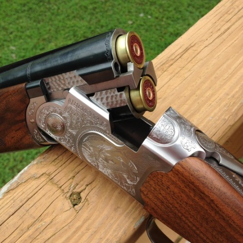 thesportinggunblog:  You chaps (and Ladies) know enough about Beretta over and unders now.Just take in the lovely engraving on the action of this gun.  Beretta Silver Pigeon and B&P shells make a nice combination.