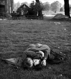  American soldier and his English girlfriend on a lawn in Hyde