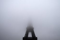  The Eiffel Tower partly hidden in the fog on Nov. 15, 2012.