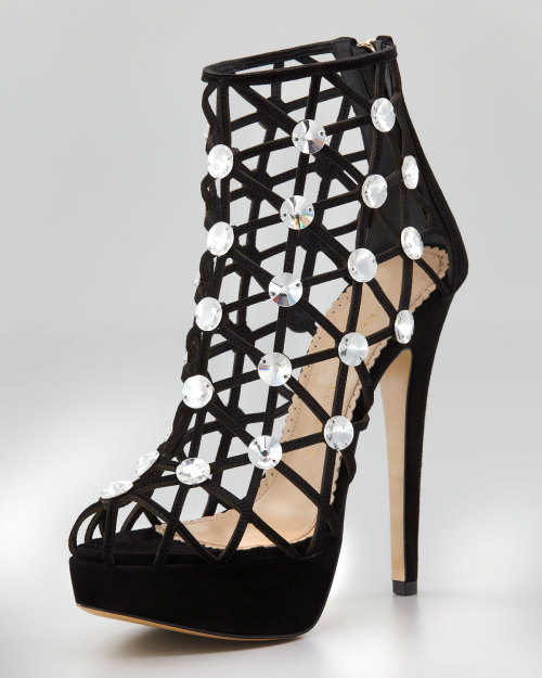 sexydesignershoes:  Charlotte Olympia - Galaxy Crystal Webbed Ankle Boot Web cage with Swarovski® crystals at intersection.5 1/2” covered heel; 1 1/4” covered platform; 4 1/4” equiv. http://www.neimanmarcus.com/  For my slave. She will be nicely