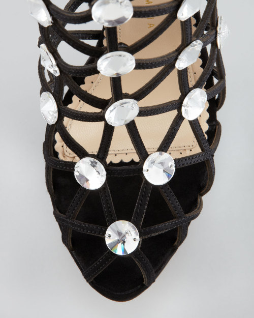 sexydesignershoes:  Charlotte Olympia - Galaxy Crystal Webbed Ankle Boot Web cage with Swarovski® crystals at intersection.5 1/2” covered heel; 1 1/4” covered platform; 4 1/4” equiv. http://www.neimanmarcus.com/  For my slave. She will be nicely