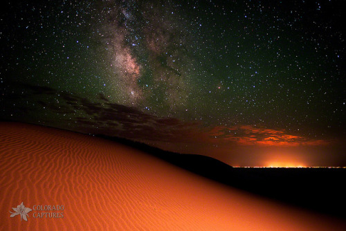 phutureprimitive:  Milky Way Gold From Sand Dunes Colorado by Mike Berenson - Colorado Captures on Flickr. 