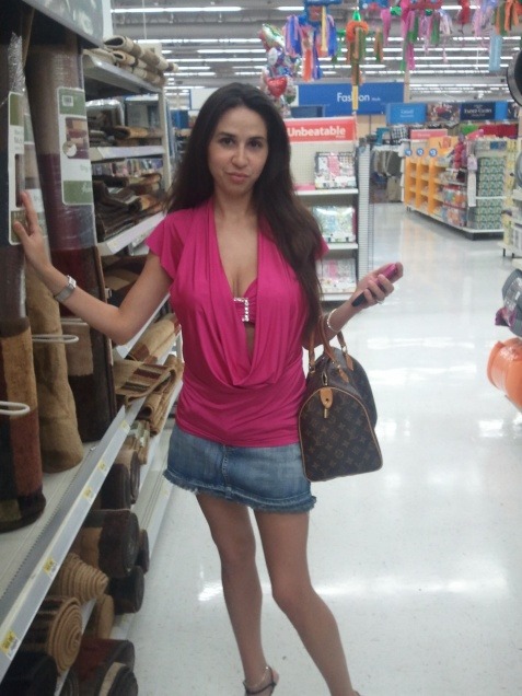 peepys-roadrunner:  This hotwife shopping at Wal-Mart, appropriately dressed like the slut she is!