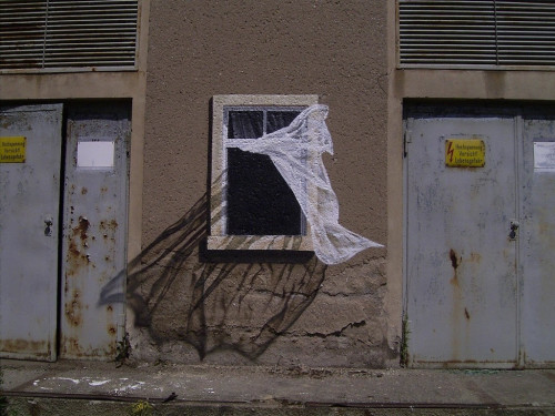 Breezy day (Nope, not a window … that’s one extraordinary work of street art!)