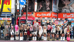 tokyo-fashion:  High resolution photo of some Black Diamond gyaru crossing the street near Shibuya 109. Check it full size! 