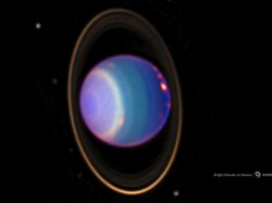 ikenbot:  Bright Clouds on Uranus The false colors in this image