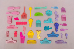 oeuf-nyc:  Toy combs from the early 90’s 