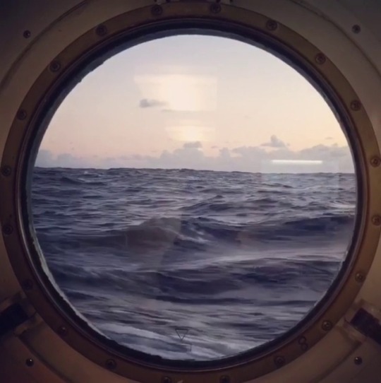 lucybellwood: Rosy morning porthole view. I could use a little of this right now.