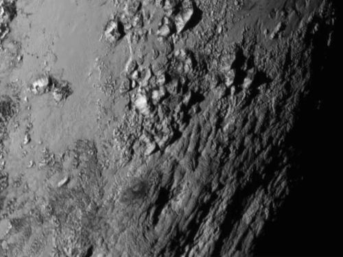 usatoday:    New close-up images of a region near Pluto’s equator reveal a giant surprise: a range of youthful mountains in this image from New Horizons’ Long Range Reconnaissance Imager (LORRI) (Photo: NASA via Getty Images) http://usat.ly/1K8hhAr