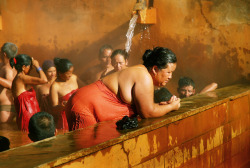   Nepali Tamang people at a hot spring, via