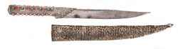 art-of-swords:  Serbian Nozh Dagger Dated: first half of the 19th century Measurements: overall length 32.5 cm With fine, intricately filigreed silver hilt of cylindrical form, the dagger is set with multiple corals on each surface. It has a straight,