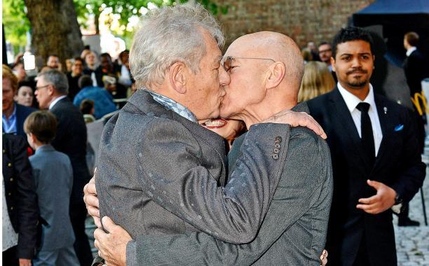 The ultimate BFFs, Ian McKellen and Patrick Stewart lock lips at Mr. Holmes premiere, proving they’re #realtionshipgoals, #squadgoals and plain old #goals.