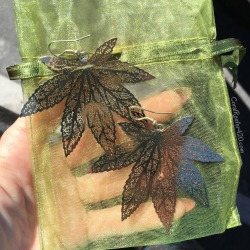 coralreefer420:  Boosted up my pot leaf earrings
