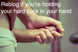 I am holding my hard cock in my hands