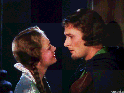 nitratediva:Olivia de Havilland and Errol Flynn in The Adventures of Robin Hood (1938).