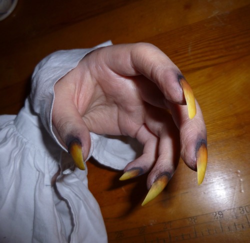 I just found out that you can use acrylic paint to make your nails look like gross claws! You put on