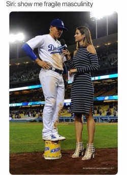 fragmentsofyouth:  pointedahead: This is ridiculous.   It was a joke people, a joke to show how tall Kelli Tennant a former volleyball player is. She’s 6’2 and wearing heels. If it was really “fragile masculinity” Enrique Hernandez wouldn’t