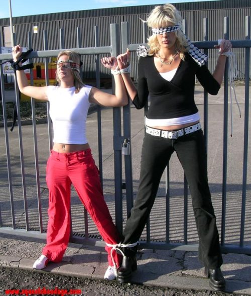 xlerstville:  graybandanna:  Busy agenda for the day: Bound and gagged in the back of a car Tied to a fence, gag removed Joined by another girl, gagged again Re-tied to fence and blindfolded with same scarves used for gags  Quite the agenda!
