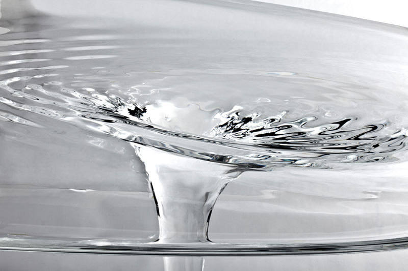 sixpenceee:  Mesa Table designed by Zaha Hadid, is a glass table that looks like