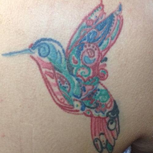 About a year and a half healed #nctattooers #tattoo #tattooedcarolina #hummingbird #razorbladetattoo