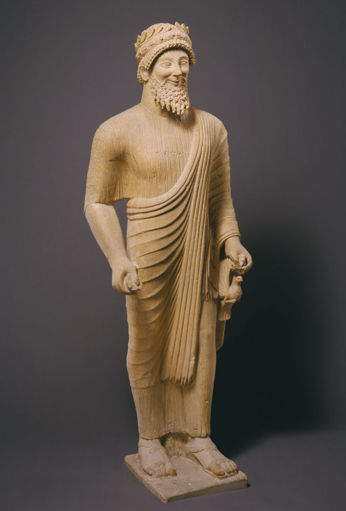 theancientwayoflife:~Limestone statue of a bearded man with votive offerings.Period: ClassicalDate: 