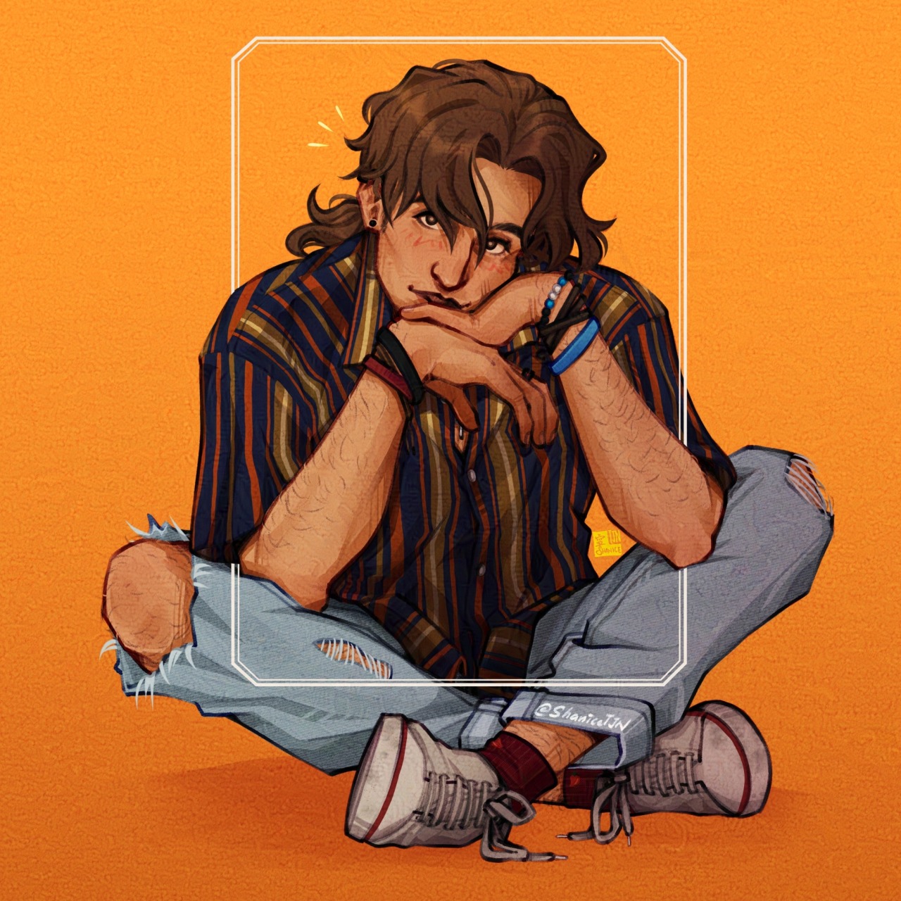 A digital artwork of my Original Character - Amadeo Di Corrado.  He is in a sitting position with his head leaning against both his hands and looking straight at the viewer. He also has a soft smile and is blushing slightly.  Amadeo is wearing his boyfriend, Azrael's, dark blue shirt with orange and gold vertical stripes. He is also wearing loose faded-blue ripped jeans with maroon socks and white sneakers.  Written text in the artwork reads @ShaniceTJN.