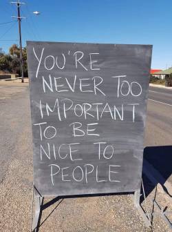 al-the-grammar-geek:[Image description: a chalkboard on the side of the road which reads “You’re never too important to be nice to people”]