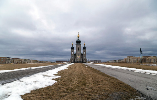 destroyed-and-abandoned:The Cathedral of the Transfiguration sits empty in the middle of the barren Cathedraltown in Markham, Ontario. by Vik Pahwa Photography