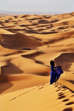 spiritedpursuit:  Currently exploring the Sahara/Merzouga region of Morocco. Woke up at 5am just to climb this monstrous dune (you can see our camp in the distance) just to watch the sun rise. And let me tell you, it was no easy hike, lol. The thing about