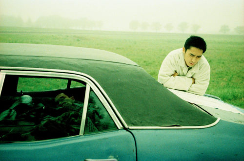 bonghive: Leslie Cheung and Tony Leung on set of Happy Together (1998) Photos by Wing Shya