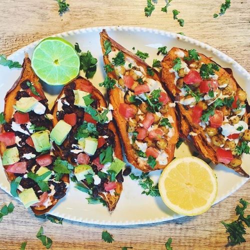 Stuffed sweet potatoes two ways - one Mexican style and one Mediterranean style! Recipe in instagram