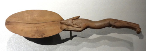 Ancient Egyptian wooden spoon with a handle in the shape of a jackal.  Artist unknown; ca. 1539-1292