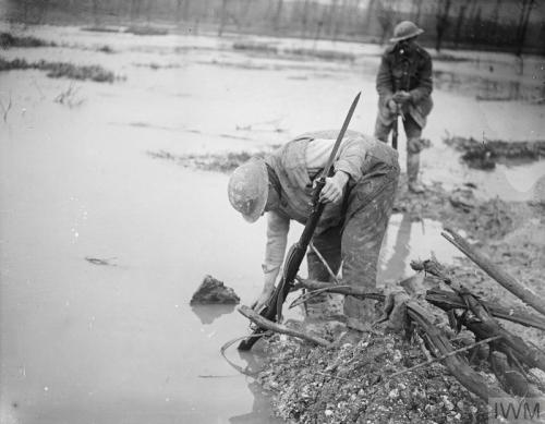 Battle of the Ancre. British soldiers washing the woodwork of their rifles in the Ancre at St. Pierr