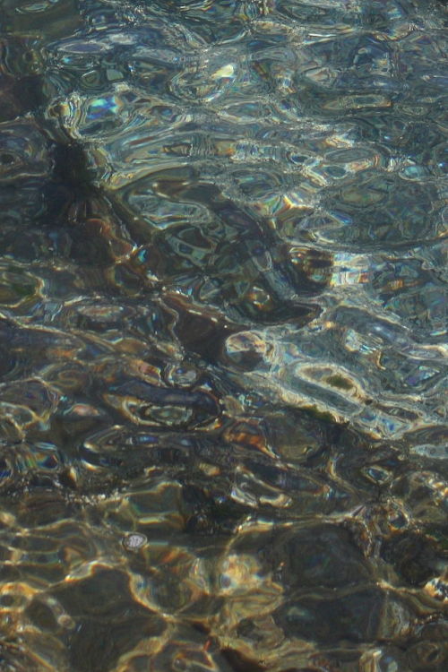 the ocean at different places at the same beach on the same day.