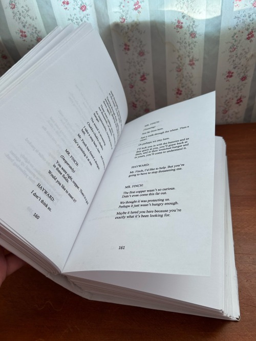ID: The pages of the book, opened to a scene mid-chapter 3. /end ID