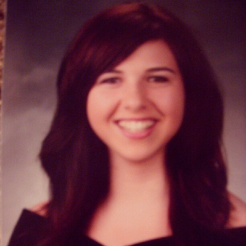Senior portrait, back when my hair was so big because it was full of secrets.